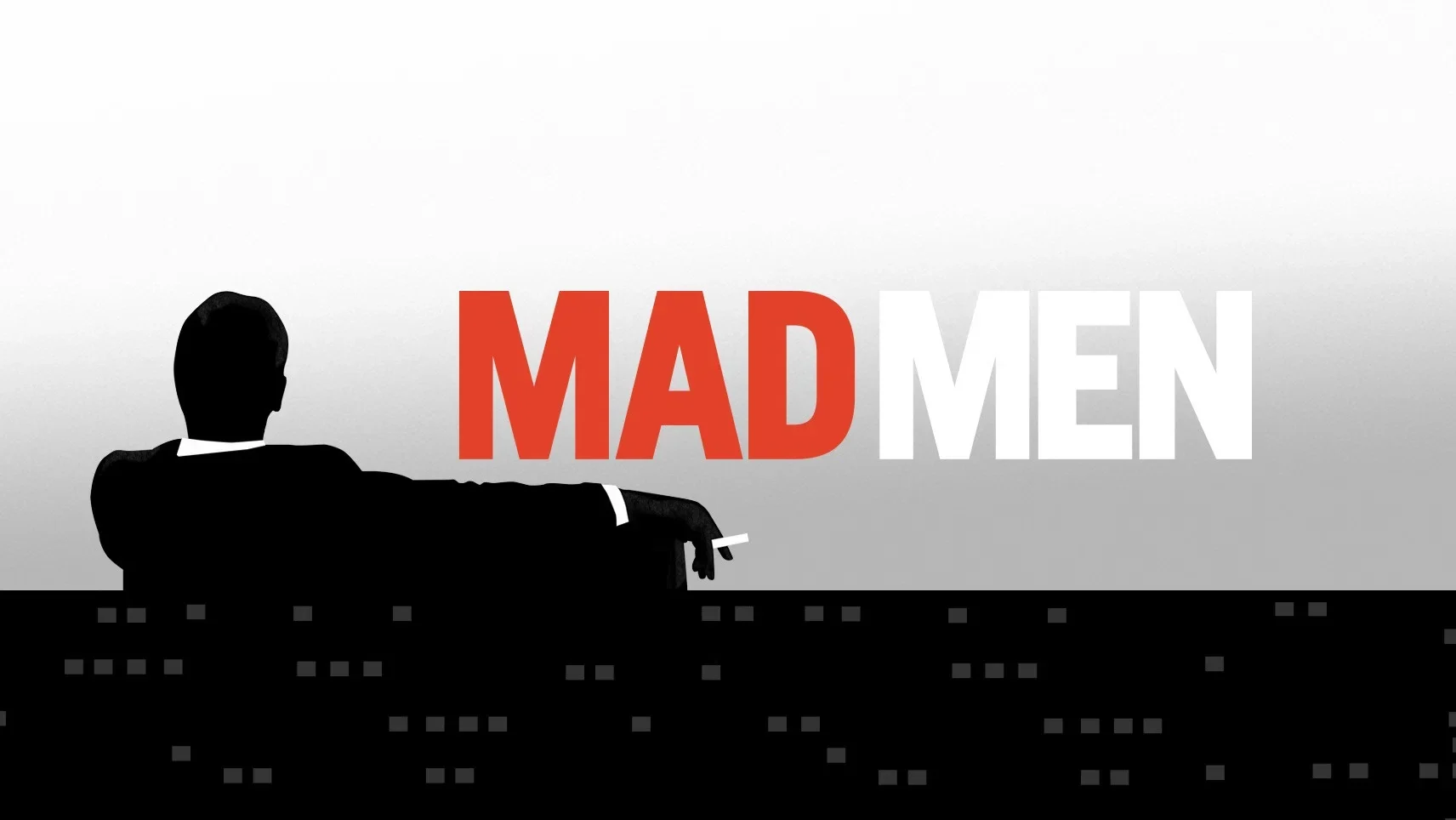 ظل رجل جالس أمام أفق مدينة مع عنوان Mad Men.